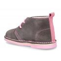 Suede leather kids safari boots with shoelaces and fake hair lining.