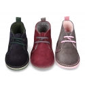 Suede leather kids safari boots with shoelaces and fake hair lining.