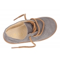 New Laces up shoes with removal tongue with fringed design in suede leather.