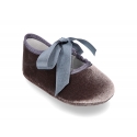 Velvet little Mary Janes for babies with ties closure.