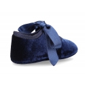 Velvet little Mary Janes for babies with ties closure.