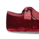 Velvet little Mary Janes for babies with ties closure.